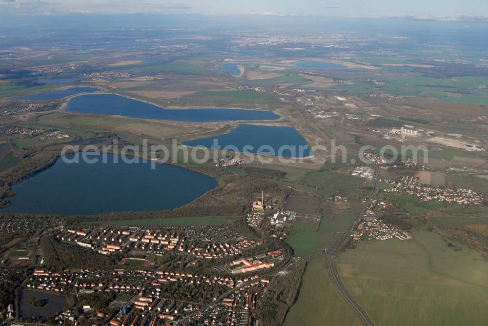 Borna from the bird's eye view: Blick auf das Umland nordlich von Borna und Borna Nord: Speicherbecken, den Haubitzer See mit dem davor liegenden Haubitz und den Hainer See sowie die Orte Eula und Kesselshain.