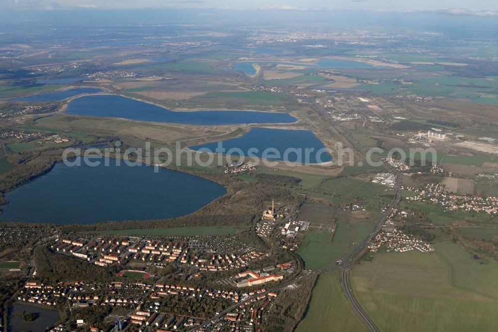 Aerial image Borna - Blick auf das Umland nordlich von Borna und Borna Nord: Speicherbecken, den Haubitzer See mit dem davor liegenden Haubitz und den Hainer See sowie die Orte Eula und Kesselshain.