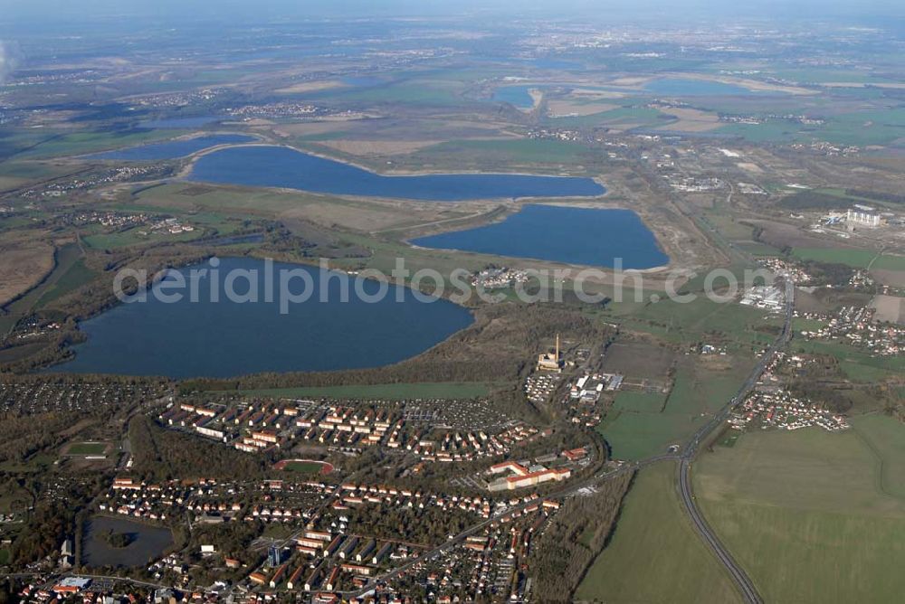 Aerial photograph Borna - Blick auf das Umland nordlich von Borna und Borna Nord: Speicherbecken, den Haubitzer See mit dem davor liegenden Haubitz und den Hainer See sowie die Orte Eula und Kesselshain.