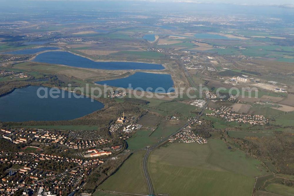 Borna from the bird's eye view: Blick auf das Umland nordlich von Borna und Borna Nord: Speicherbecken, den Haubitzer See mit dem davor liegenden Haubitz und den Hainer See sowie die Orte Eula und Kesselshain.