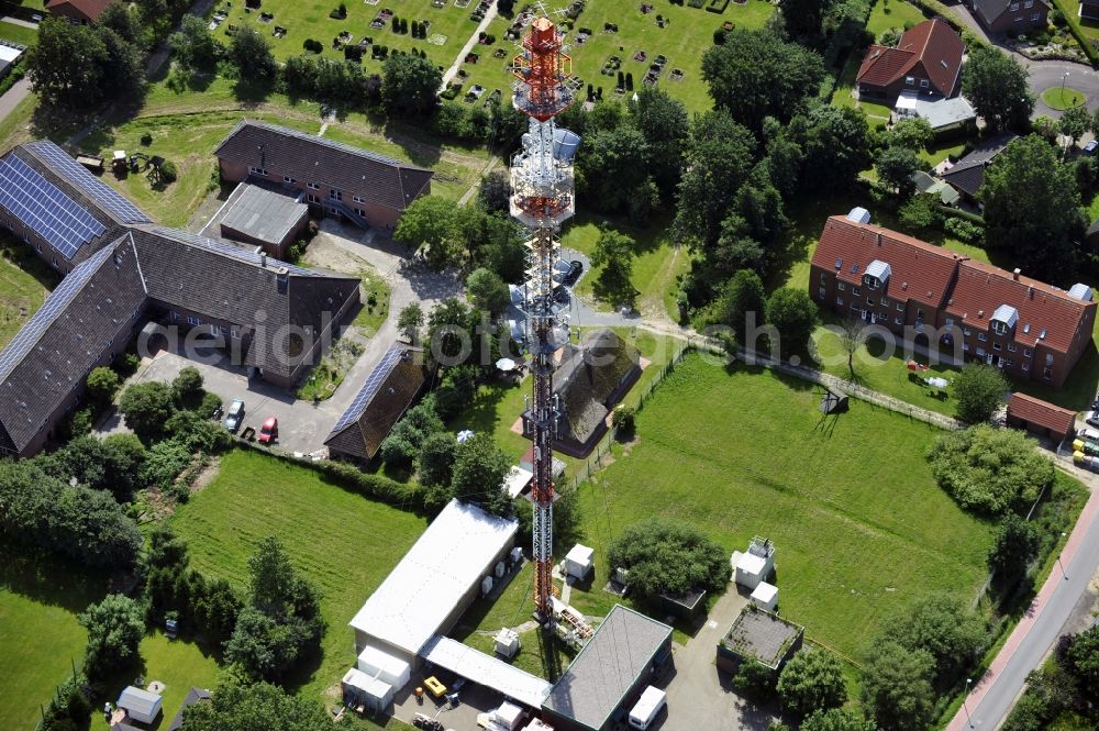 Aerial photograph Garding - Blick auf den Umsetzer/ Sendemast Garding auch bekannt als Fernsehsender Eiderstedt. Die Sanierungsarbeiten wurden ausgeführt durch die Firma Werner Diener GmbH & Co. Industrieanstrich KG. Restoration works on the broadcasting tower / transmitter mast Garding.