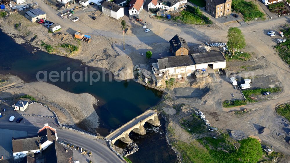 Aerial image Rech - Destruction landscape on the river - bridge construction to cross the Ahr Nepomukbruecke on the Brueckenstrasse almost a year after the flood disaster in Rech im Ahrtal in the state Rhineland-Palatinate, Germany