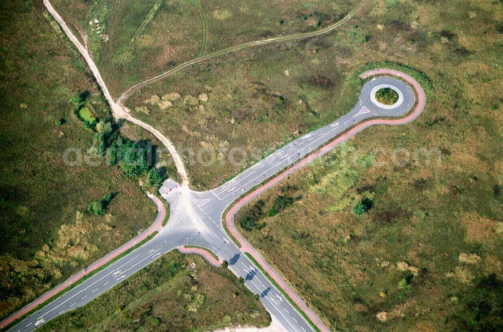 Königswusterhausen / Brandenburg from above - Die unfertige Straße im Gewerbegebiet Königswusterhausen - Ost, an der A10 und der Berliner-Chaussee, sowie der Chausseestraße.