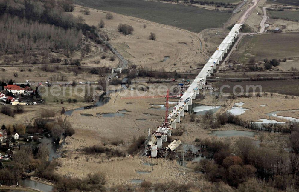 Aerial image Osendorf - Elsteraue, Blick auf die Unglücksstelle beim Ausbau der ICE Strecke. An der Baustelle des ICE - Viaduktes bei Osendorf sind beim Einsturz eines Krans und eines Baugerüsts zwölf Bauarbeiter verletzt worden, einer davon schwer. Nach Polizeiangaben war der Kran umgestürzt und riss das etwa 1000 Tonnen schwere Gerüst mit sich. Look at the crash site in the development of the trail near Osendorf / Germany.At the construction site of the ICE - viaduct at Osendorfer are injured in the collapse of a crane and a scaffolding construction workers.