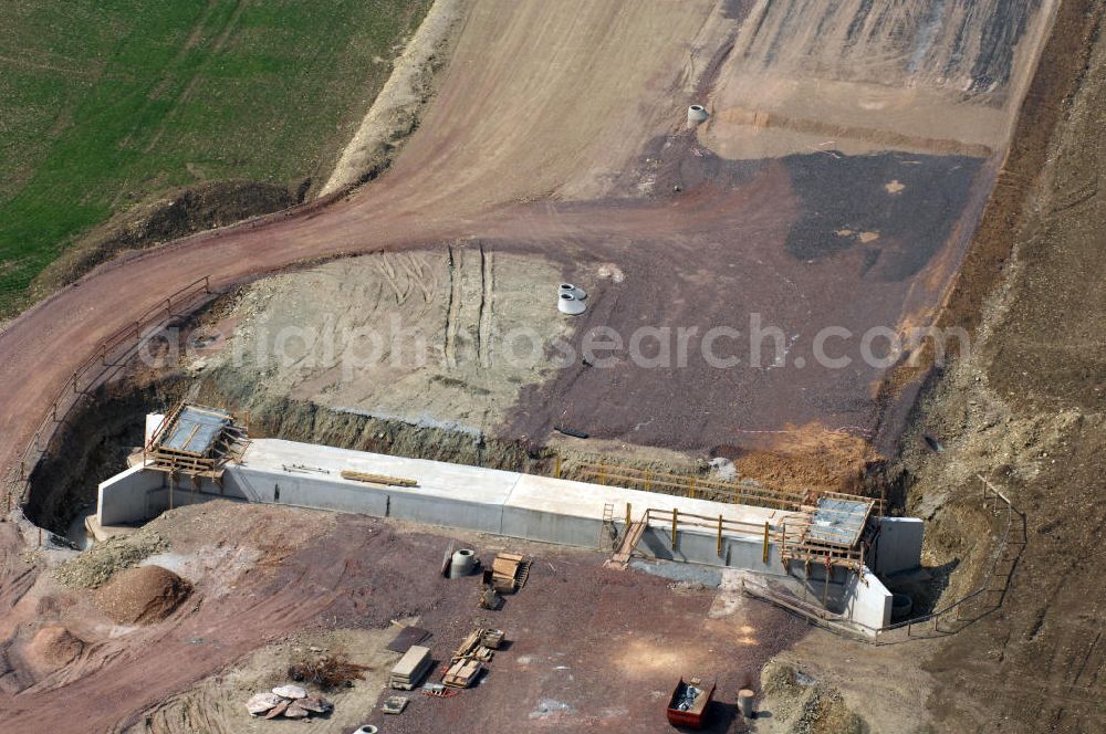 Aerial image Ettenhausen - Blick auf die Baustelle einer Unterführung der A4 bei Ettenhausen. Der Neubau ist Teil des Projekt Nordverlegung / Umfahrung Hörselberge der Autobahn E40 / A4 in Thüringen bei Eisenach. Durchgeführt werden die im Zuge dieses Projektes notwendigen Arbeiten unter an derem von den Mitarbeitern der Niederlassung Weimar der EUROVIA Verkehrsbau Union sowie der Niederlassungen Abbruch und Erdbau, Betonstraßenbau, Ingenieurbau und TECO Schallschutz der EUROVIA Beton sowie der DEGES.