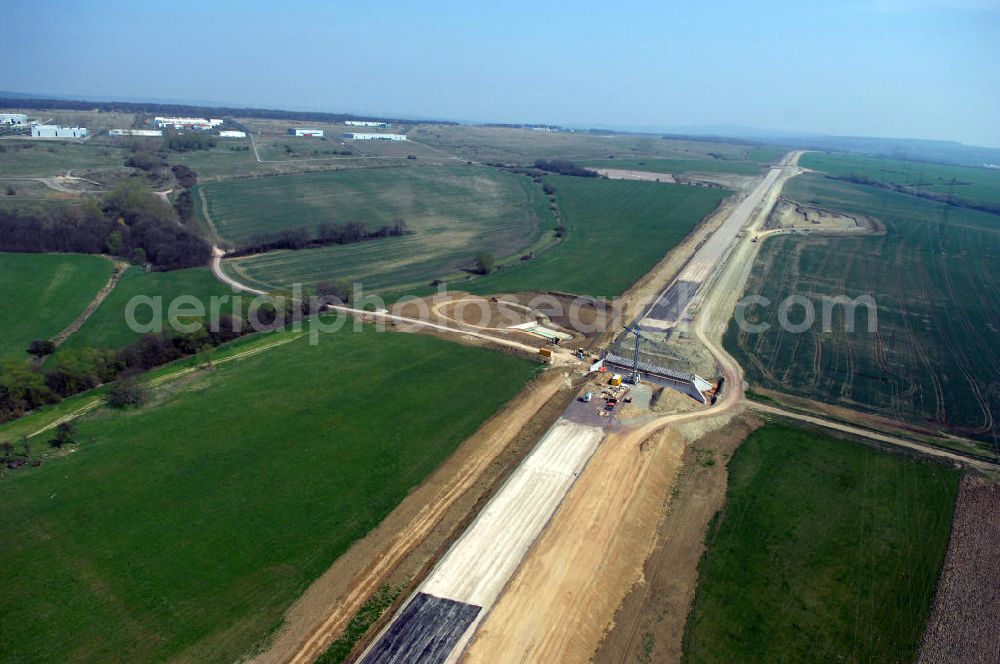 Aerial image Großenlupnitz - Blick auf die Baustelle einer Unterführung der A4 bei Großenlupnitz. Der Neubau ist Teil des Projekt Nordverlegung / Umfahrung Hörselberge der Autobahn E40 / A4 in Thüringen bei Eisenach. Durchgeführt werden die im Zuge dieses Projektes notwendigen Arbeiten unter an derem von den Mitarbeitern der Niederlassung Weimar der EUROVIA Verkehrsbau Union sowie der Niederlassungen Abbruch und Erdbau, Betonstraßenbau, Ingenieurbau und TECO Schallschutz der EUROVIA Beton sowie der DEGES.