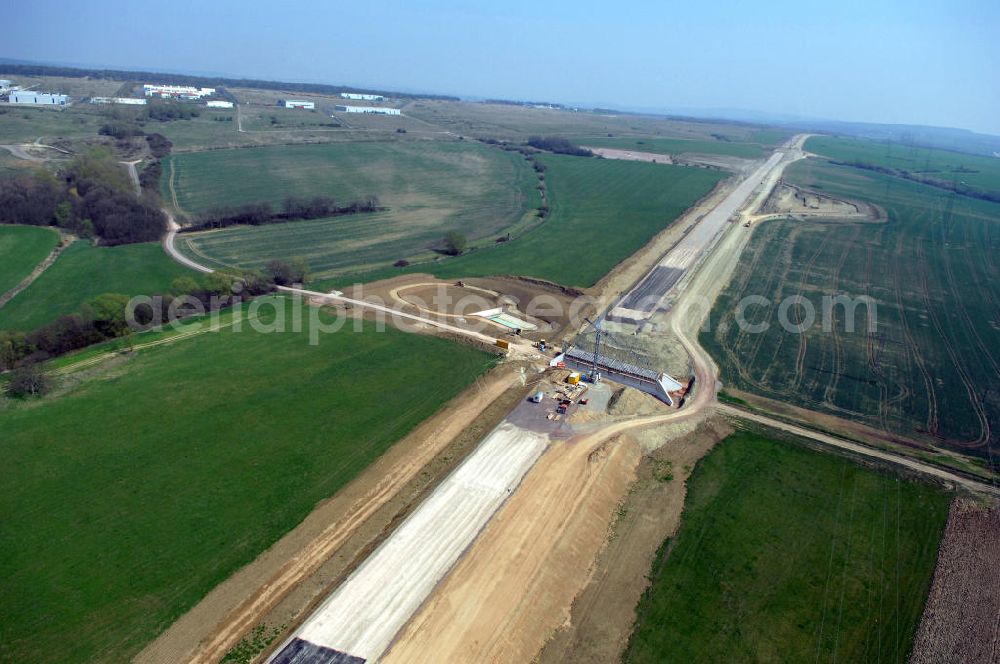 Aerial photograph Großenlupnitz - Blick auf die Baustelle einer Unterführung der A4 bei Großenlupnitz. Der Neubau ist Teil des Projekt Nordverlegung / Umfahrung Hörselberge der Autobahn E40 / A4 in Thüringen bei Eisenach. Durchgeführt werden die im Zuge dieses Projektes notwendigen Arbeiten unter an derem von den Mitarbeitern der Niederlassung Weimar der EUROVIA Verkehrsbau Union sowie der Niederlassungen Abbruch und Erdbau, Betonstraßenbau, Ingenieurbau und TECO Schallschutz der EUROVIA Beton sowie der DEGES.