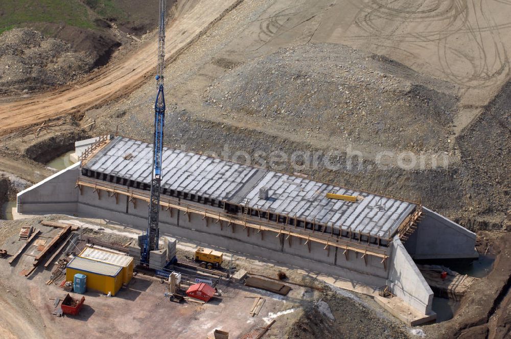 Aerial image Hastrungsfeld - Blick auf die Baustelle einer Unterführung der A4 bei Wenigenlupnitz. Der Neubau ist Teil des Projekt Nordverlegung / Umfahrung Hörselberge der Autobahn E40 / A4 in Thüringen bei Eisenach. Durchgeführt werden die im Zuge dieses Projektes notwendigen Arbeiten unter an derem von den Mitarbeitern der Niederlassung Weimar der EUROVIA Verkehrsbau Union sowie der Niederlassungen Abbruch und Erdbau, Betonstraßenbau, Ingenieurbau und TECO Schallschutz der EUROVIA Beton sowie der DEGES.