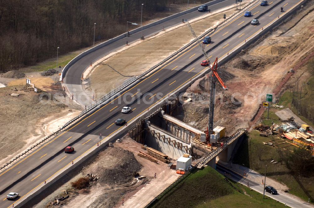 Eisenach from above - Blick auf die Baustelle einer Unterführung der A4 östlich der Raststätte Eisenach. Der Neubau ist Teil des Projekt Nordverlegung / Umfahrung Hörselberge der Autobahn E40 / A4 in Thüringen bei Eisenach. Durchgeführt werden die im Zuge dieses Projektes notwendigen Arbeiten unter an derem von den Mitarbeitern der Niederlassung Weimar der EUROVIA Verkehrsbau Union sowie der Niederlassungen Abbruch und Erdbau, Betonstraßenbau, Ingenieurbau und TECO Schallschutz der EUROVIA Beton sowie der DEGES.