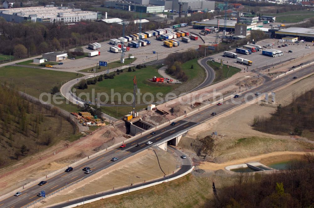 Eisenach from above - Blick auf die Baustelle einer Unterführung der A4 mit Regenrückhaltebecken östlich der Raststätte Eisenach. Der Neubau ist Teil des Projekt Nordverlegung / Umfahrung Hörselberge der Autobahn E40 / A4 in Thüringen bei Eisenach. Durchgeführt werden die im Zuge dieses Projektes notwendigen Arbeiten unter an derem von den Mitarbeitern der Niederlassung Weimar der EUROVIA Verkehrsbau Union sowie der Niederlassungen Abbruch und Erdbau, Betonstraßenbau, Ingenieurbau und TECO Schallschutz der EUROVIA Beton sowie der DEGES.