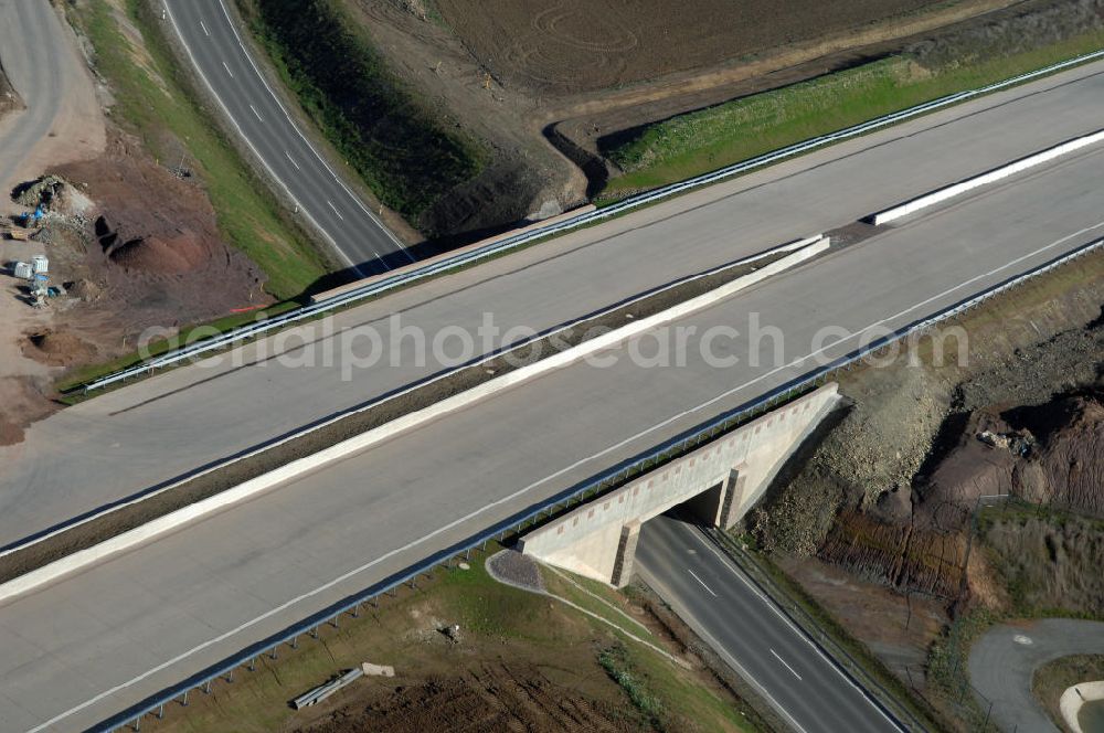 Neukirchen from the bird's eye view: Blick auf die Baustelle einer Unterführung der A4 für die Strassenverbindung zwischen Stregda und Neukirchen. Der Neubau ist Teil des Projekt Nordverlegung / Umfahrung Hörselberge der Autobahn E40 / A4 in Thüringen bei Eisenach. Durchgeführt werden die im Zuge dieses Projektes notwendigen Arbeiten unter an derem von den Mitarbeitern der Niederlassung Weimar der EUROVIA Verkehrsbau Union sowie der Niederlassungen Abbruch und Erdbau, Betonstraßenbau, Ingenieurbau und TECO Schallschutz der EUROVIA Beton sowie der DEGES.