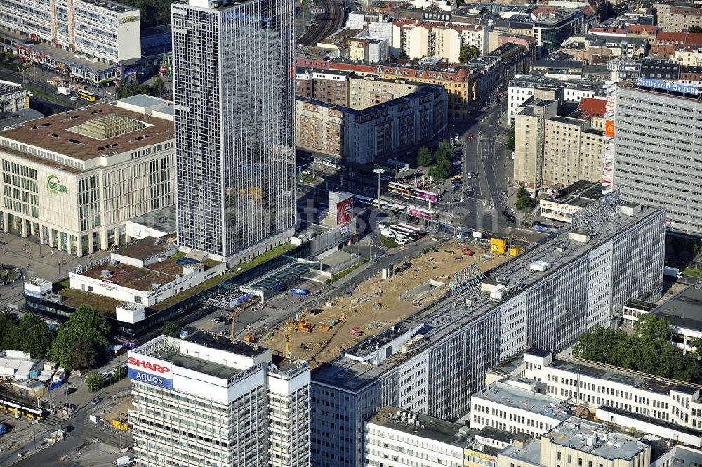 Aerial image Berlin - Blick auf die Baustelle des unterirdischen Parkhauses am Park Inn Hotel am Alexanderplatz durch die Firma WÖHR + BAUER GmbH. Speziell hier entsteht eine neue mit Wolfgang Gerberen Mitteln finanzierte Tiefgarage mit 600 Stellplätzen / Parkplätzen. View of the construction site of the underground parking garage at Park Inn Hotel at Alexanderplatz specifically by the company WÖHR + BAUER GmbH here a new funded with Wolfgang Gerbere funds creates underground parking with 600 parking spaces / parking areas. BERGER BAU und MAX AICHER Bau GMBH