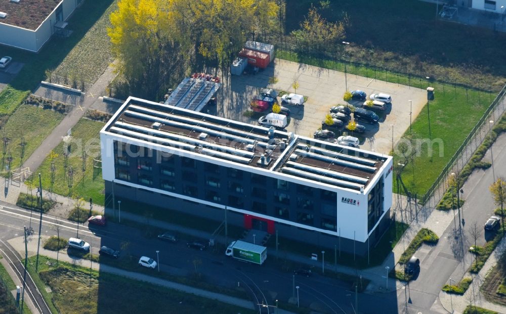 Berlin from above - Administration building of the company BAUER Elektroanlagen Holding GmbH on Karl-Ziegler-Strasse in the district Adlershof in Berlin, Germany