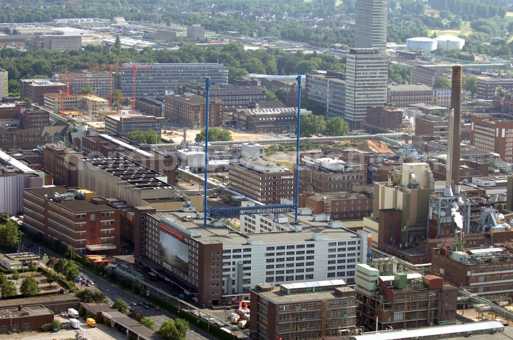 Aerial image Leverkusen - Blick auf das Werksgelände der Firma TERRITORY CTR GmbH in Leverkusen. Die Leuchtreklame hängt an zwei 118 Meter hohen Stahlmasten und wurde 1958 installiert. Sie zeigt nur das Emblem der Firma Bayer. Kontakt: TERRITORY CTR GmbH, 51368 Leverkusen, Tel. +49(0)214 30 1,