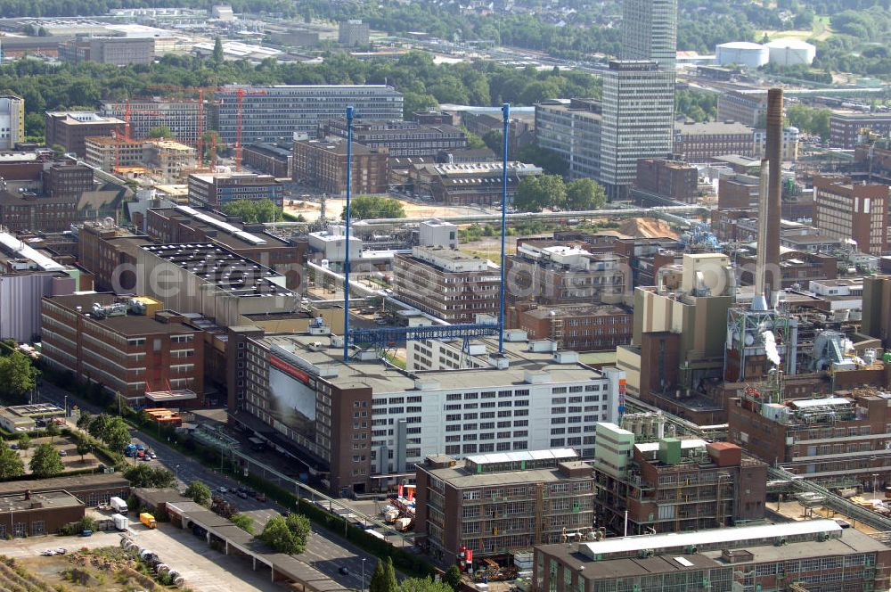 Aerial photograph Leverkusen - Blick auf das Werksgelände der Firma TERRITORY CTR GmbH in Leverkusen. Die Leuchtreklame hängt an zwei 118 Meter hohen Stahlmasten und wurde 1958 installiert. Sie zeigt nur das Emblem der Firma Bayer. Kontakt: TERRITORY CTR GmbH, 51368 Leverkusen, Tel. +49(0)214 30 1,