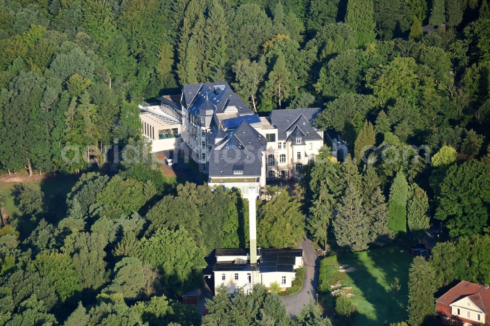 Melsungen from the bird's eye view: Administration building of the company of B. Braun Melsungen AG on Stadtwaldpark in Melsungen in the state Hesse, Germany