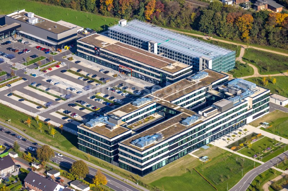 Aerial photograph Moers - Corporate administration building of EDEKA Handelsgesellschaft Rhein-Ruhr mbH on Rheinberger Strasse in the district of Repelen in Moers in the federal state of North Rhine-Westphalia, Germany