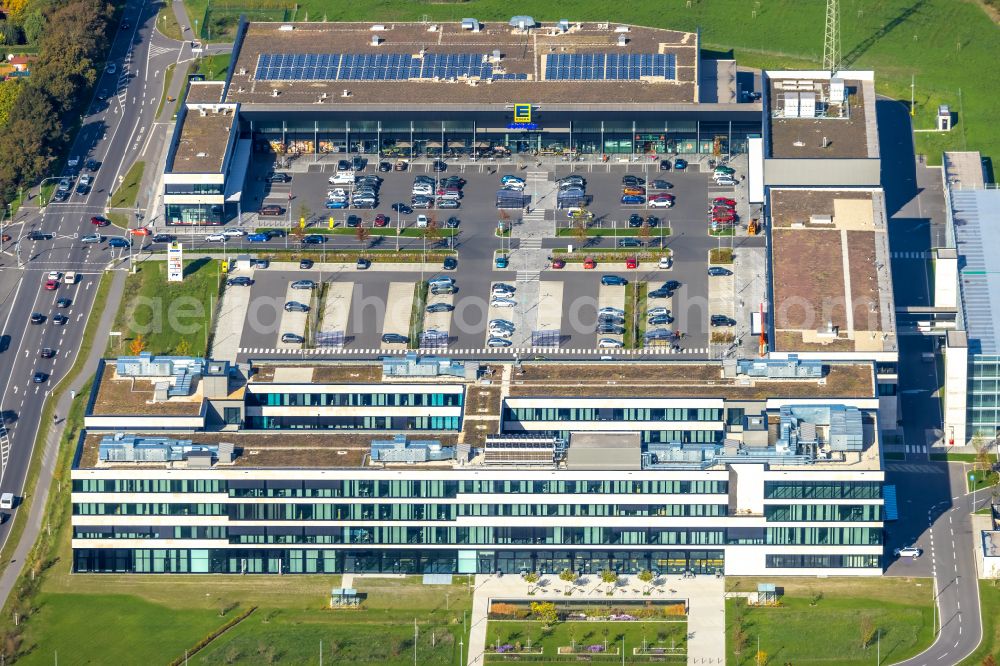 Moers from the bird's eye view: Corporate administration building of EDEKA Handelsgesellschaft Rhein-Ruhr mbH on Rheinberger Strasse in the district of Repelen in Moers in the federal state of North Rhine-Westphalia, Germany