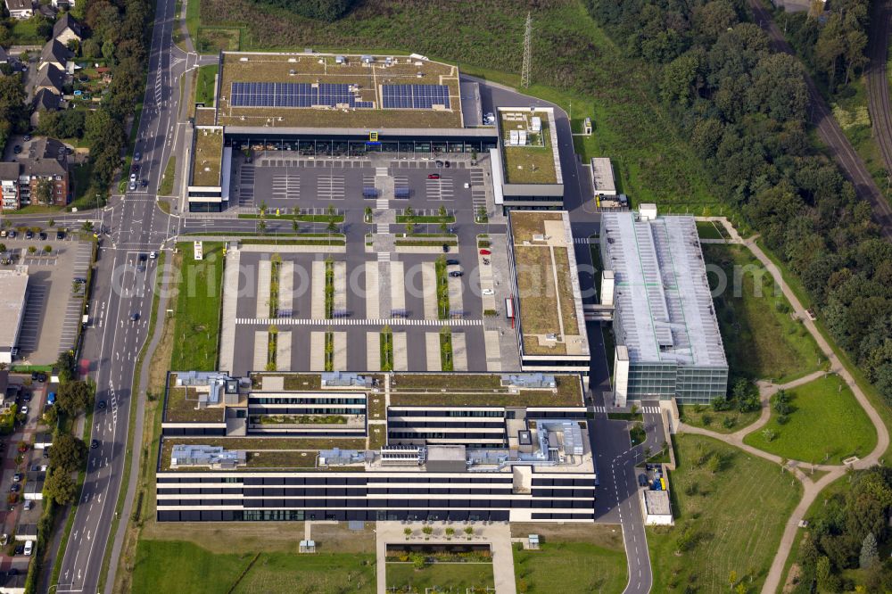 Moers from the bird's eye view: Corporate administration building of EDEKA Handelsgesellschaft Rhein-Ruhr mbH on Rheinberger Strasse in the district of Repelen in Moers in the federal state of North Rhine-Westphalia, Germany