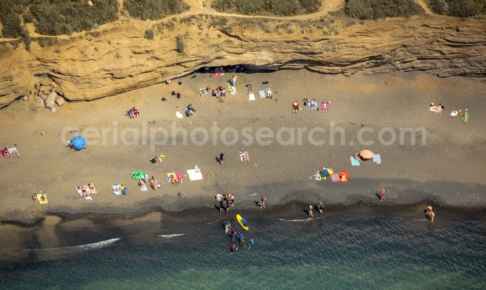 Agde from above - Tourists on the beach cliffs of Mediterranean coast landscape in Agde in the province of Languedoc-Roussillon in France