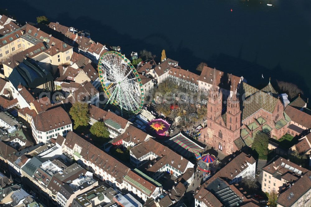 Aerial photograph Basel - Event site of the Autumn Fair with ferris wheel and cathedral in the Old Town in Basle, Switzerland