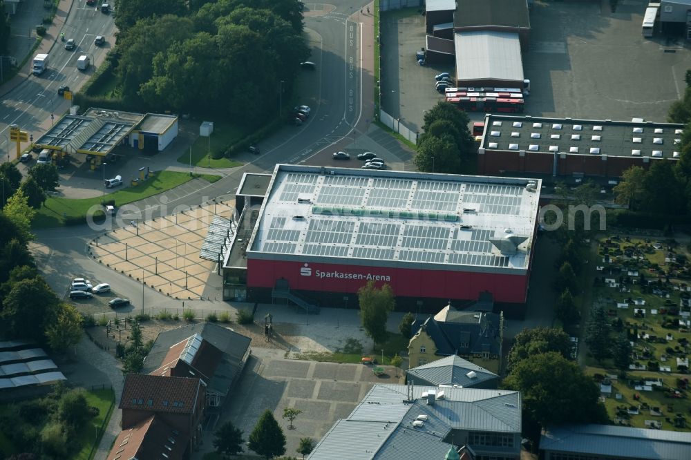 Aerial photograph Aurich - Building of the indoor arena Sparkassen-Arena of the operating company mbH & Co. KG for halls and baths next to the cemetery in Aurich in the state Lower Saxony