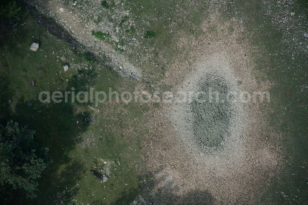 Ilmtal from the bird's eye view: Decay and vegetation growth of the ruins of the building complex of the former military barracks of NVA of formerly GDR Army in Ilmtal in the state Thuringia, Germany