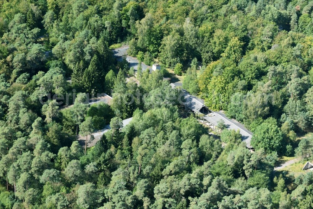 Aerial photograph Parmen - Decay and vegetation growth of the ruins of the building complex of the former military barracks of NVA Nationale Volksarmee formerly GDR in Parmen in the state Brandenburg