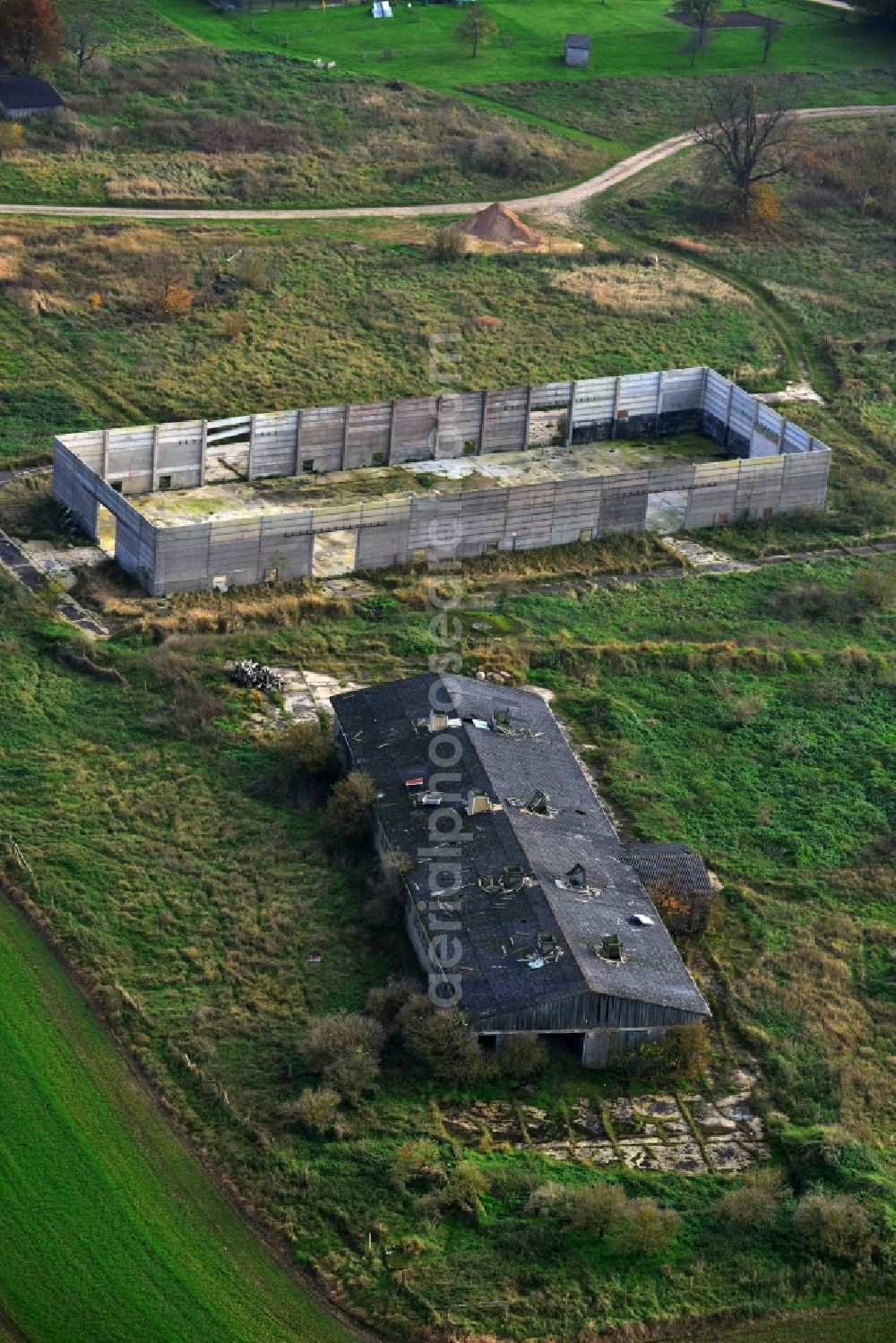 Schönhausen from above - Decaying ruins of an LPG agricultural cooperative in the former GDR Schoenhausen in Mecklenburg - Western Pomerania