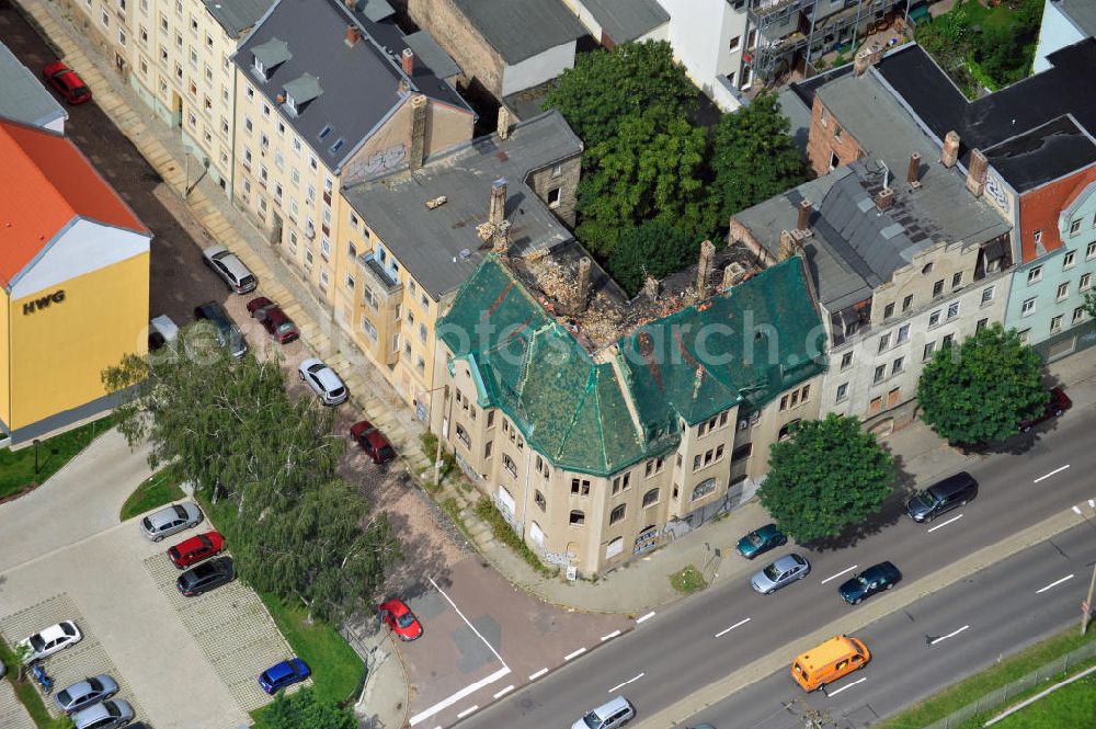 Aerial image Halle an der Saale - View of dilapidated buildings in Dzondi street in the Mediziner district in Halle. The Halle Housing Society (HWG) is investing in the renovation of the district