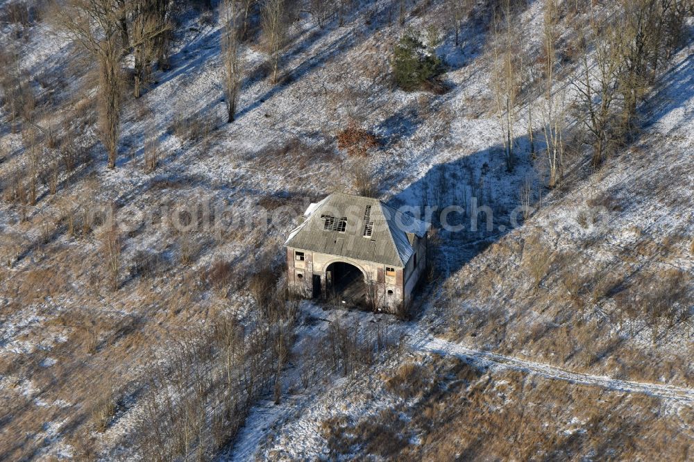 Brandenburg an der Havel from above - Decaying former military building in a snow-covered park on Magdeburger Strasse in Brandenburg an der Havel in the state of Brandenburg. The area is being redeveloped as a commercial and industrial area