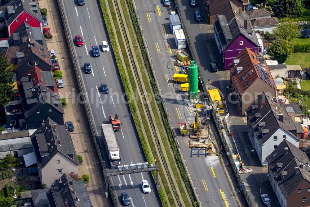 Essen from above - Filling of the possible days break at blocking the motorway A40 motorway and the A52 in Essen in North Rhine-Westphalia