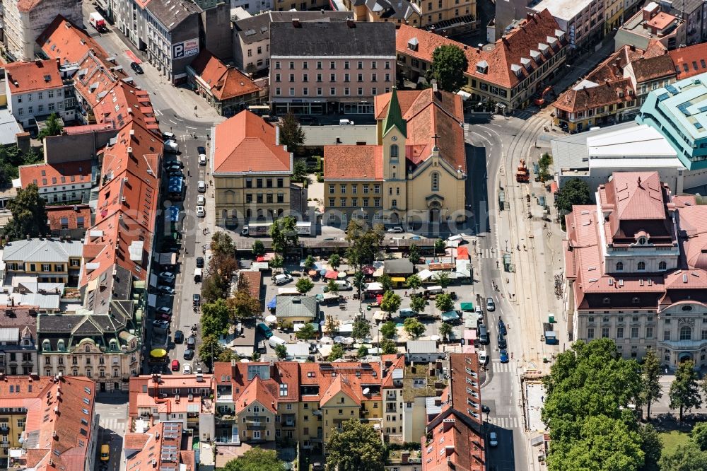 Aerial image Graz - Sale and food stands and trade stalls in the market place of Bauernmarkt on Kaiserplatz-Josef-Platz in Graz in Steiermark, Austria