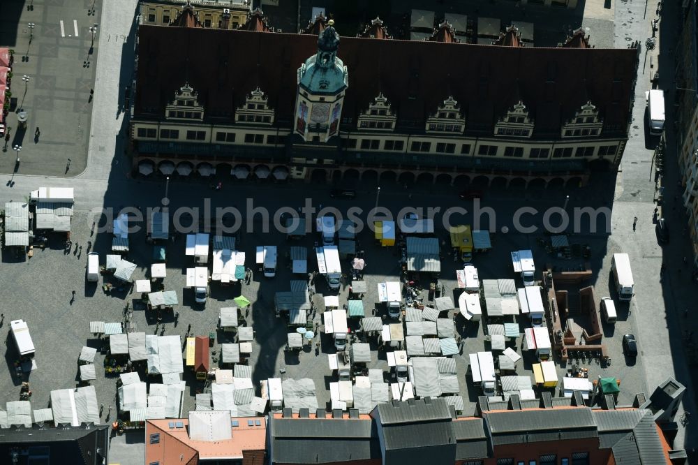 Leipzig from above - Sale and food stands and trade stalls in the market place at the town hall of the inner city center in Leipzig in the state Saxony