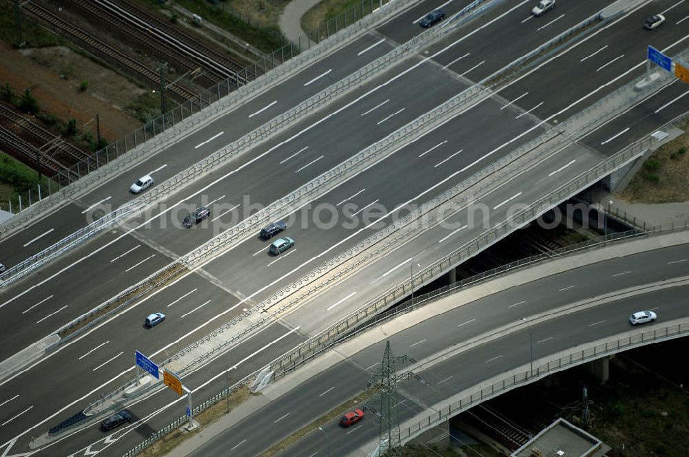 Schönefeld from the bird's eye view: Blick auf den Bereich der Stadtautobahn / Zubringer A113n als südöstliches Tor zur Hauptstadt nach der Verkehrsfreigabe. Unter Berücksichtigung des Flughafens Berlin Brandenburg International wurde eine Verkehrskonzeption für den Ausbau des Straßennetzes im Raum Berlin-Schönefeld erarbeitet, die zwei Stufen umfasste. Die erste Stufe sah den vierstreifigen Ausbau der Bundesstraßen B 96a und B 179 mit der Anbindung des Flughafens über zwei Knotenpunkte vor. Inhalt der zweiten Stufe war der Anschluß der Bundesautobahn A 113 neu an die B 96a und B 179. SCHÜßLER Plan Ingenieurgesellschaft, BATEG, EUROVIA, Schüßler Plan