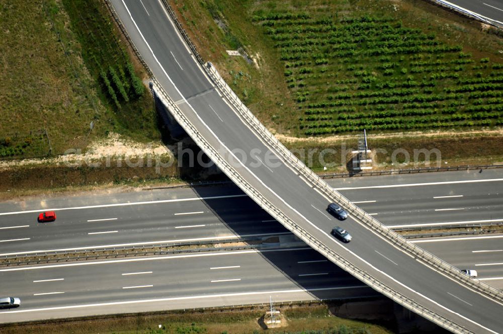 Aerial image Schönefeld - Blick auf den Bereich der Stadtautobahn / Zubringer A113n als südöstliches Tor zur Hauptstadt nach der Verkehrsfreigabe. Unter Berücksichtigung des Flughafens Berlin Brandenburg International wurde eine Verkehrskonzeption für den Ausbau des Straßennetzes im Raum Berlin-Schönefeld erarbeitet, die zwei Stufen umfasste. Die erste Stufe sah den vierstreifigen Ausbau der Bundesstraßen B 96a und B 179 mit der Anbindung des Flughafens über zwei Knotenpunkte vor. Inhalt der zweiten Stufe war der Anschluß der Bundesautobahn A 113 neu an die B 96a und B 179. SCHÜßLER Plan Ingenieurgesellschaft, BATEG, EUROVIA, Schüßler Plan