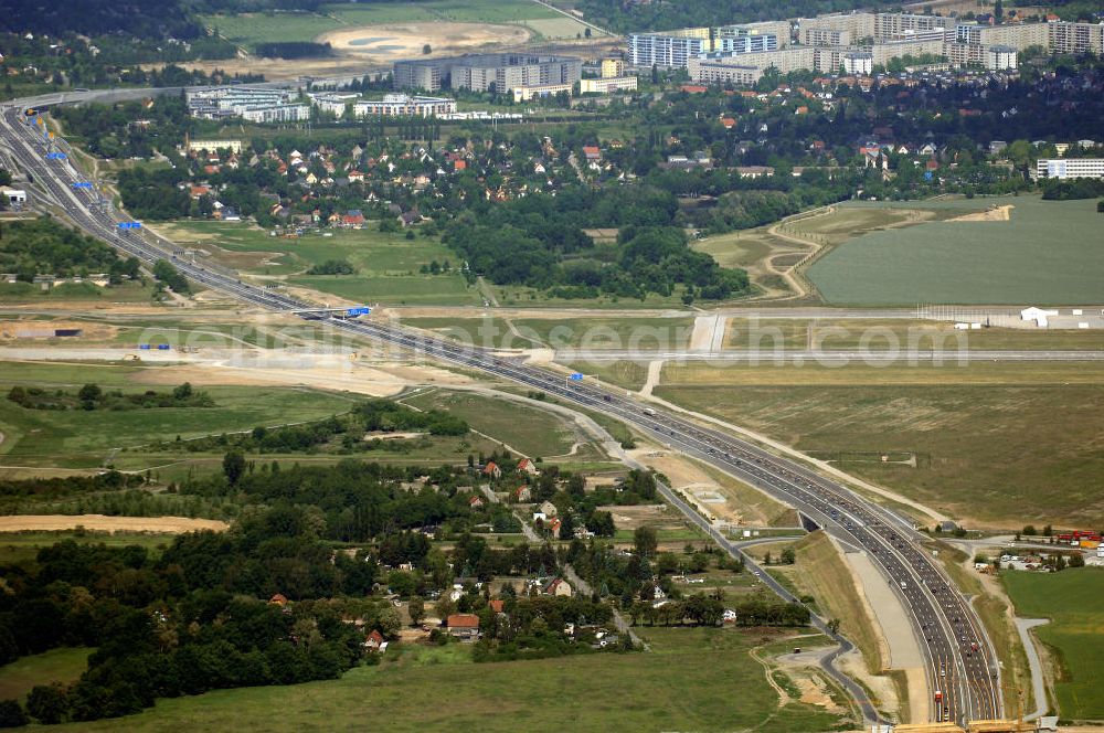 Schönefeld from the bird's eye view: Blick auf den Bereich der Stadtautobahn / Zubringer A113n als südöstliches Tor zur Hauptstadt nach der Verkehrsfreigabe. Unter Berücksichtigung des Flughafens Berlin Brandenburg International wurde eine Verkehrskonzeption für den Ausbau des Straßennetzes im Raum Berlin-Schönefeld erarbeitet, die zwei Stufen umfasste. Die erste Stufe sah den vierstreifigen Ausbau der Bundesstraßen B 96a und B 179 mit der Anbindung des Flughafens über zwei Knotenpunkte vor. Inhalt der zweiten Stufe war der Anschluß der Bundesautobahn A 113 neu an die B 96a und B 179. SCHÜßLER Plan Ingenieurgesellschaft, BATEG, EUROVIA, Schüßler Plan