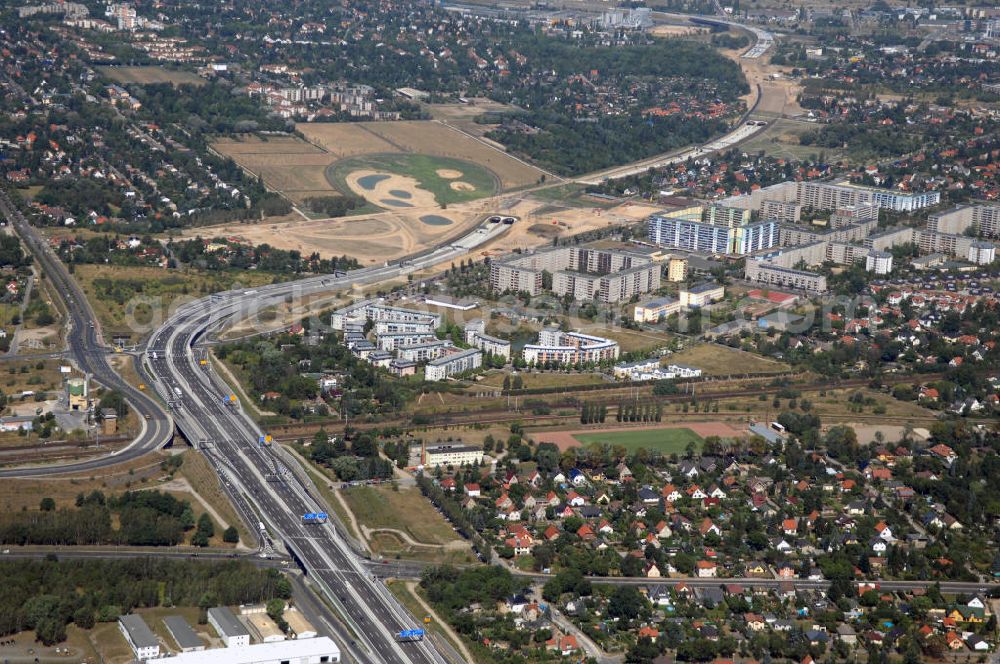 Schönefeld from the bird's eye view: Blick auf den Bereich der Stadtautobahn / Zubringer A113n als südöstliches Tor zur Hauptstadt nach der Verkehrsfreigabe. Unter Berücksichtigung des Flughafens Berlin Brandenburg International wurde eine Verkehrskonzeption für den Ausbau des Straßennetzes im Raum Berlin-Schönefeld erarbeitet, die zwei Stufen umfasste. Die erste Stufe sah den vierstreifigen Ausbau der Bundesstraßen B 96a und B 179 mit der Anbindung des Flughafens über zwei Knotenpunkte vor. Inhalt der zweiten Stufe war der Anschluß der Bundesautobahn A 113 neu an die B 96a und B 179. SCHÜßLER Plan Ingenieurgesellschaft, BATEG, EUROVIA