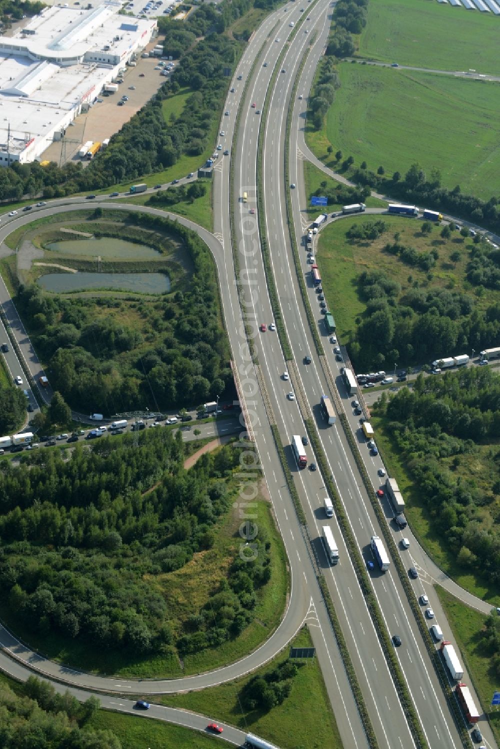 Aerial image Chemnitz - Traffic flow at the intersection- motorway A72 in Chemnitz in the state of Saxony. The motorway A72 and federal highway B173 meet at the clover leaf interchange