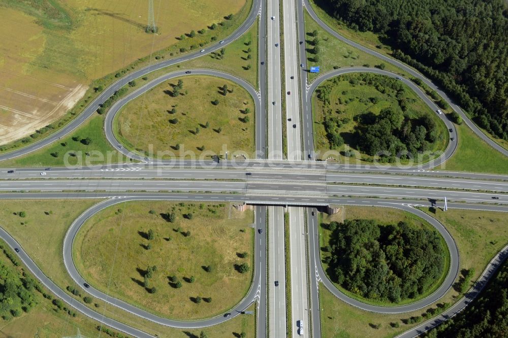 Aerial photograph Kessin - Traffic flow at the intersection- motorway A 19 und A20 - Autobahnkreuz Rostock in Kessin in the state Mecklenburg - Western Pomerania