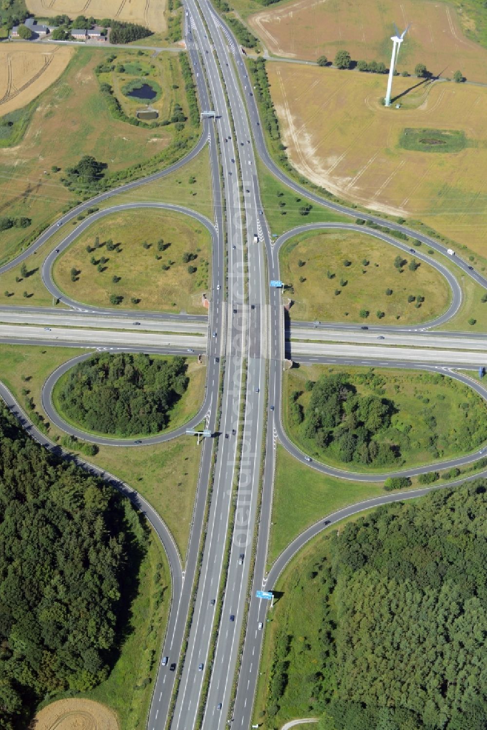 Aerial image Kessin - Traffic flow at the intersection- motorway A 19 und A20 - Autobahnkreuz Rostock in Kessin in the state Mecklenburg - Western Pomerania