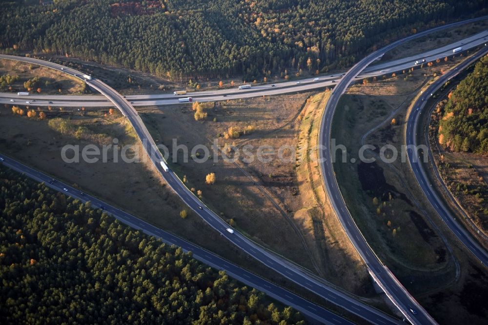 Aerial photograph Spreenhagen - Traffic flow at the intersection- motorway A 12 E30 am Berliner Ring in Spreenhagen in the state Brandenburg