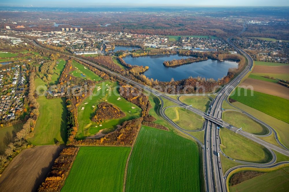 Duisburg from the bird's eye view: Traffic management at the motorway junction of the A59 motorway and the main road 288 Duisburg-Sued in Duisburg in North Rhine-Westphalia. The federal highway B8n forms an extension of the A59 southbound until the middle of Duesseldorf. In the background of the Framers lake