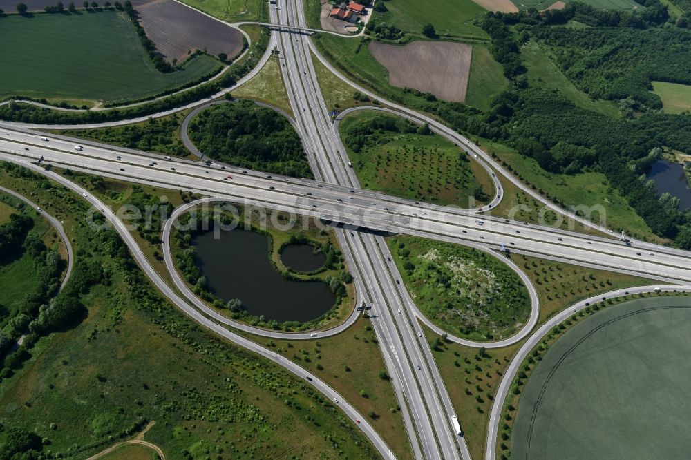 Hamberge from the bird's eye view: Traffic flow at the intersection- motorway A 20 - A1 in Hamberge in the state Schleswig-Holstein