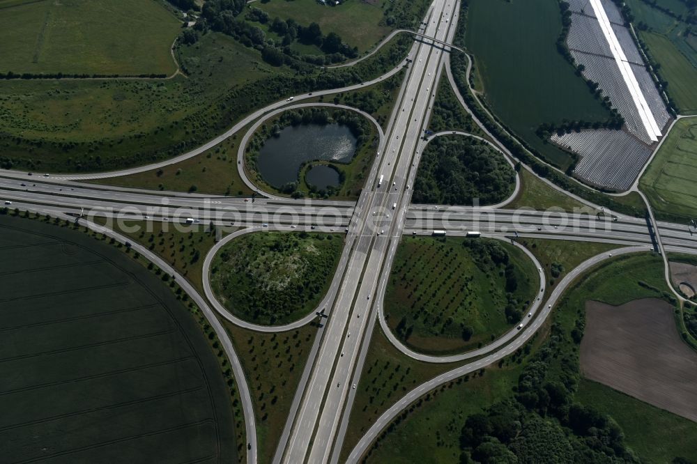 Hamberge from above - Traffic flow at the intersection- motorway A 20 - A1 in Hamberge in the state Schleswig-Holstein