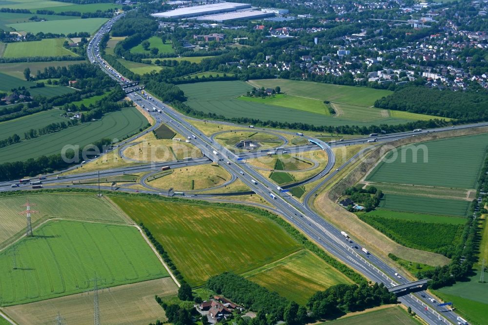 Aerial photograph Kamen - Traffic flow at the intersection- motorway A 1 A2 Kamener Kreuz in Kamen at Ruhrgebiet in the state North Rhine-Westphalia, Germany