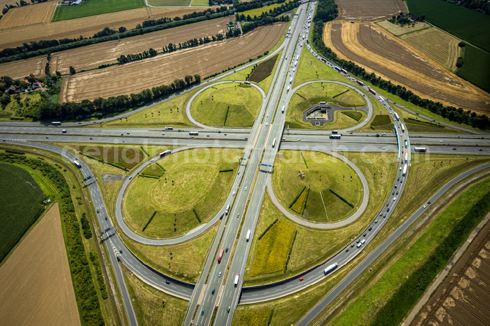 Kamen from above - Traffic flow at the intersection- motorway A 1 A2 Kamener Kreuz in Kamen in the state North Rhine-Westphalia, Germany