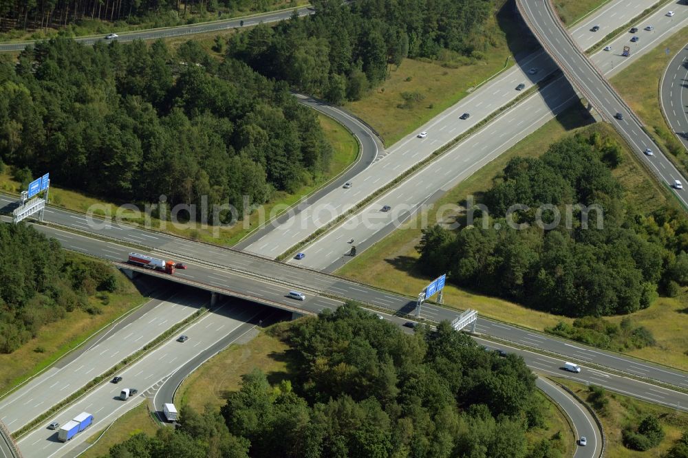 Schönefeld from the bird's eye view: Traffic flow at the intersection- motorway A 10 - E36 Schoenefelder Kreuz in Schoenefeld in the state Brandenburg