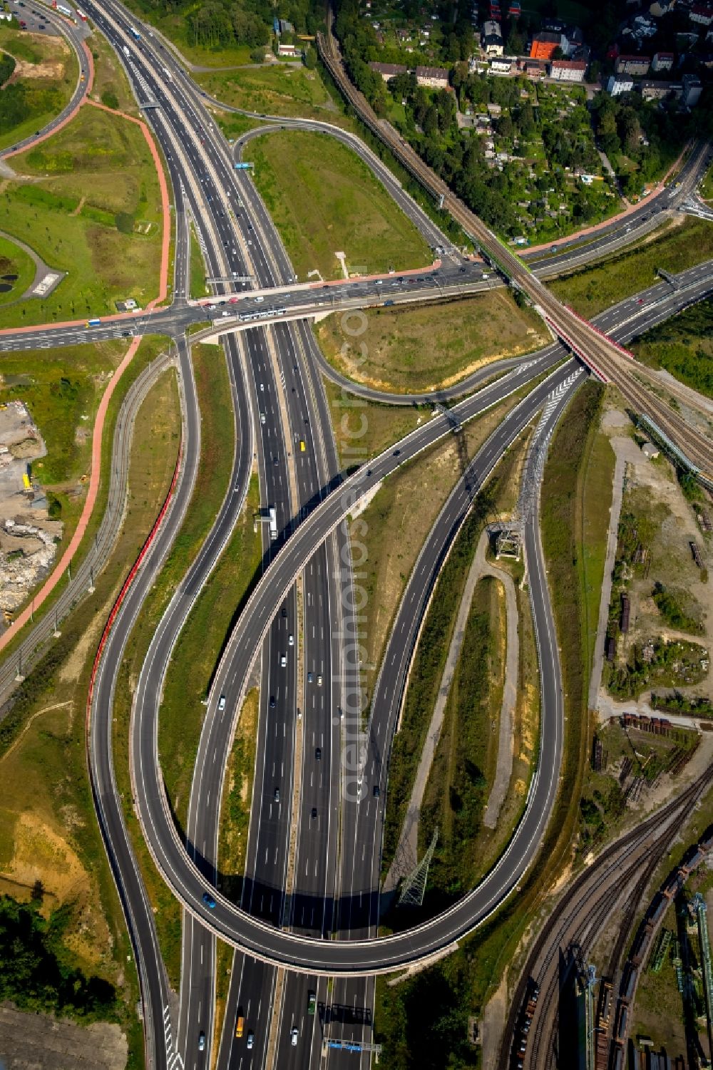 Aerial photograph Bochum - Traffic flow at the motorway junction, Bochum West Cross, between the A40 and the A 448 in Bochum in North Rhine-Westphalia