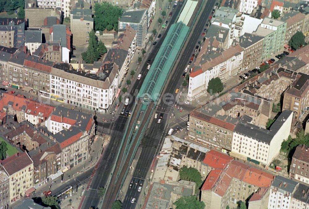 Aerial image Berlin - The traffic junction intersection Schoenhauser-Allee, Danziger-Strasse, Kastanienallee, of poplars is spanned by Metro Station Eberswalde Strasse